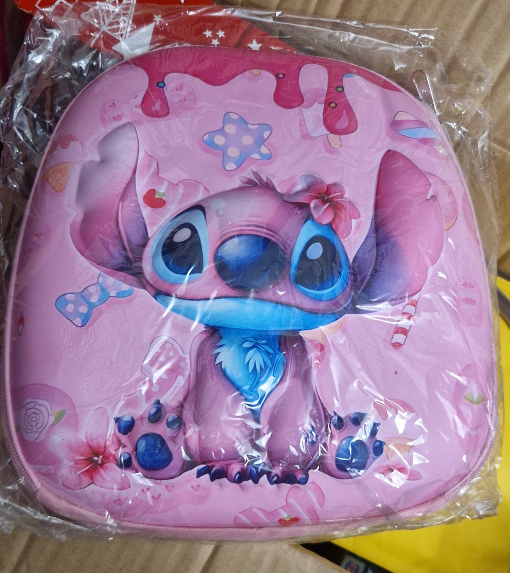 A pink Disney Stitch zippered pouch in clear plastic packaging, resting on a brown cardboard box.